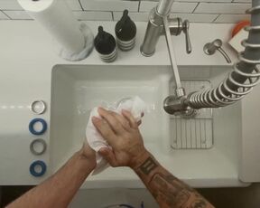 In-Home Massage Therapist Austin Wolf Washes Hands