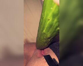 Swiss girl fucks herself with a cucumber