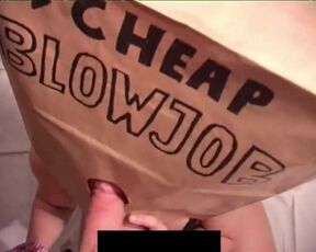 Anonymous Prostitute Cheap Blowjob Wearing a Paper Bag